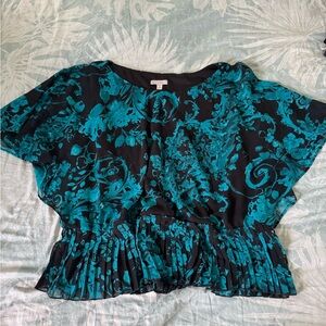 Chic Black Blouse with Elegant Floral Design